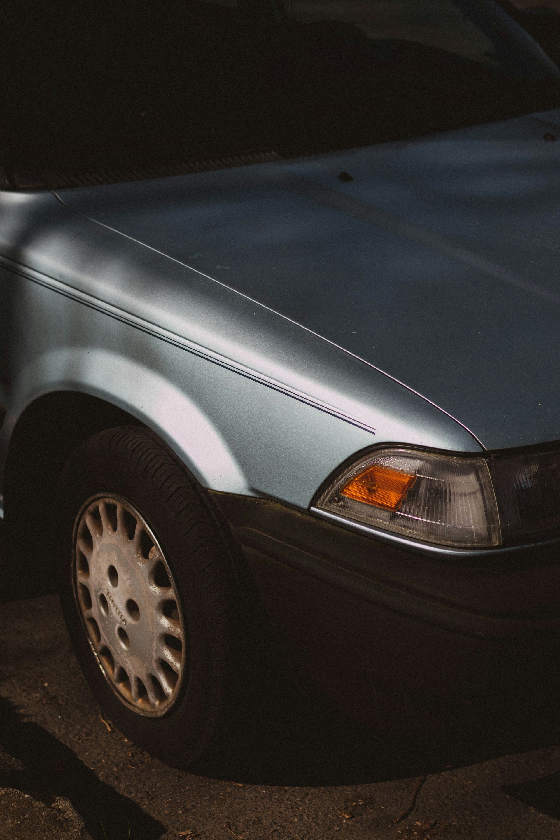 white car with gray wheel